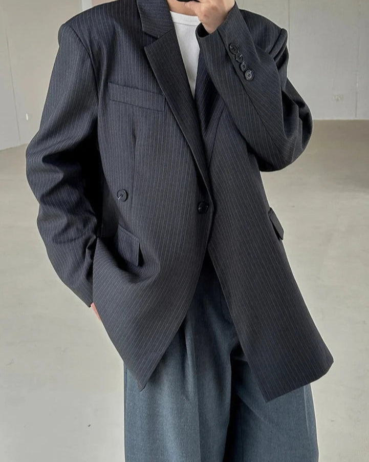 Blazer Marcelle gris pour femme, une coupe élégante et moderne.