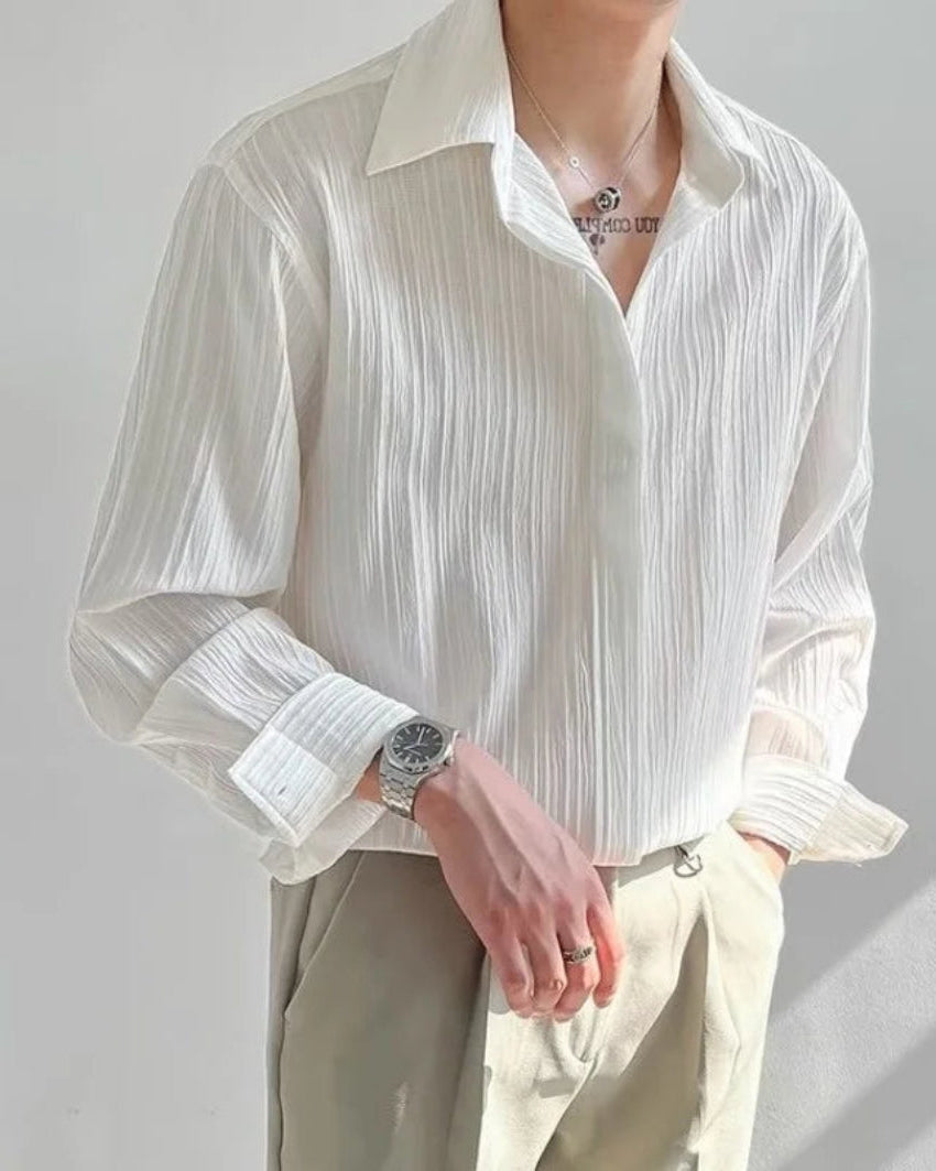Chemise Raoul blanche pour homme avec col rabattu et boutonnage simple.
