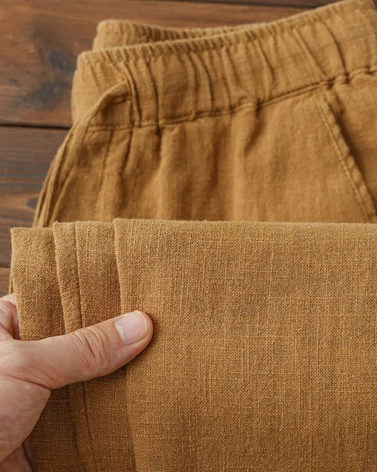 Pantalon droit homme couleur café, tissu large, longueur cheville.