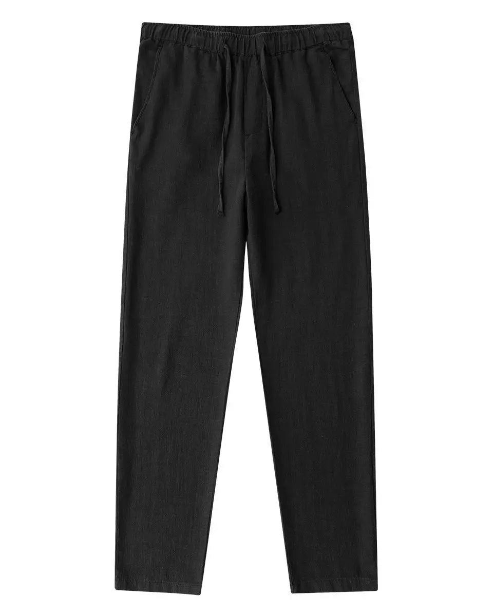 Pantalon noir homme, coupe droite classique, tissu large.