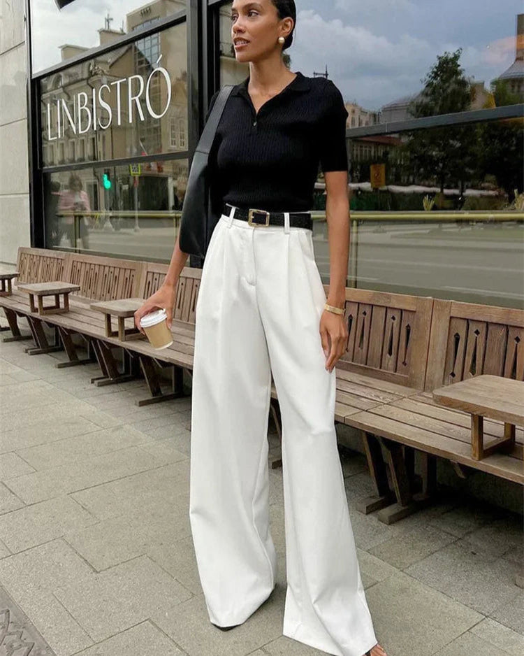 Pantalon Margherite blanc pour femme, coupe à jambes larges et longueur cheville élégante.