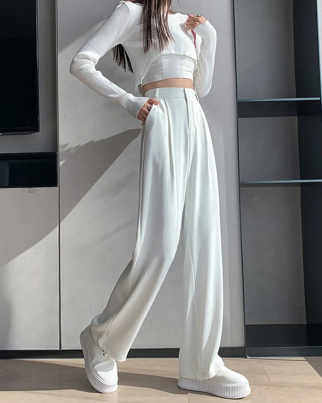 Pantalon Zélie femme, décliné en blanc et café, coupe large et fluide en mousseline de soie.