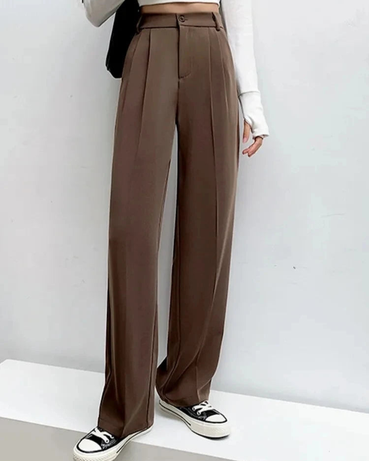 Pantalon Zélie femme, chic et confortable, en mousseline de soie avec braguette zippée.