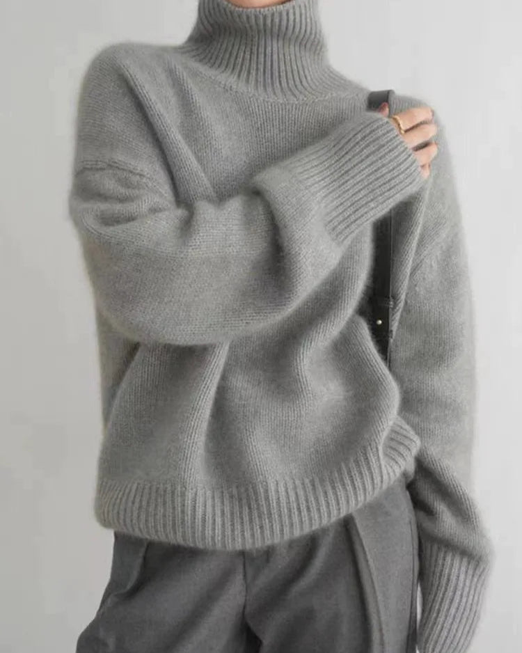 Pull Colette gris en cachemire, coupe ample et confort sophistiqué.