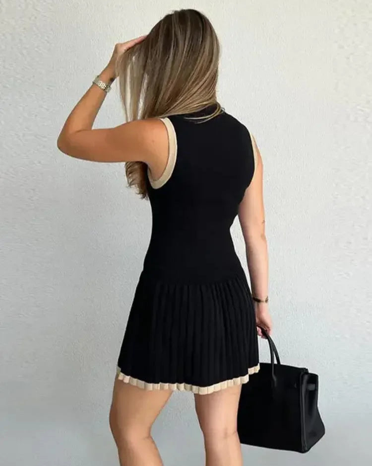 Robe Luce noire pour femme, en maille avec col rond et coupe slim élégante.