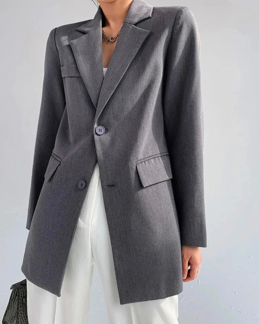 Blazer Luce gris pour femme, coupe élégante et intemporelle.