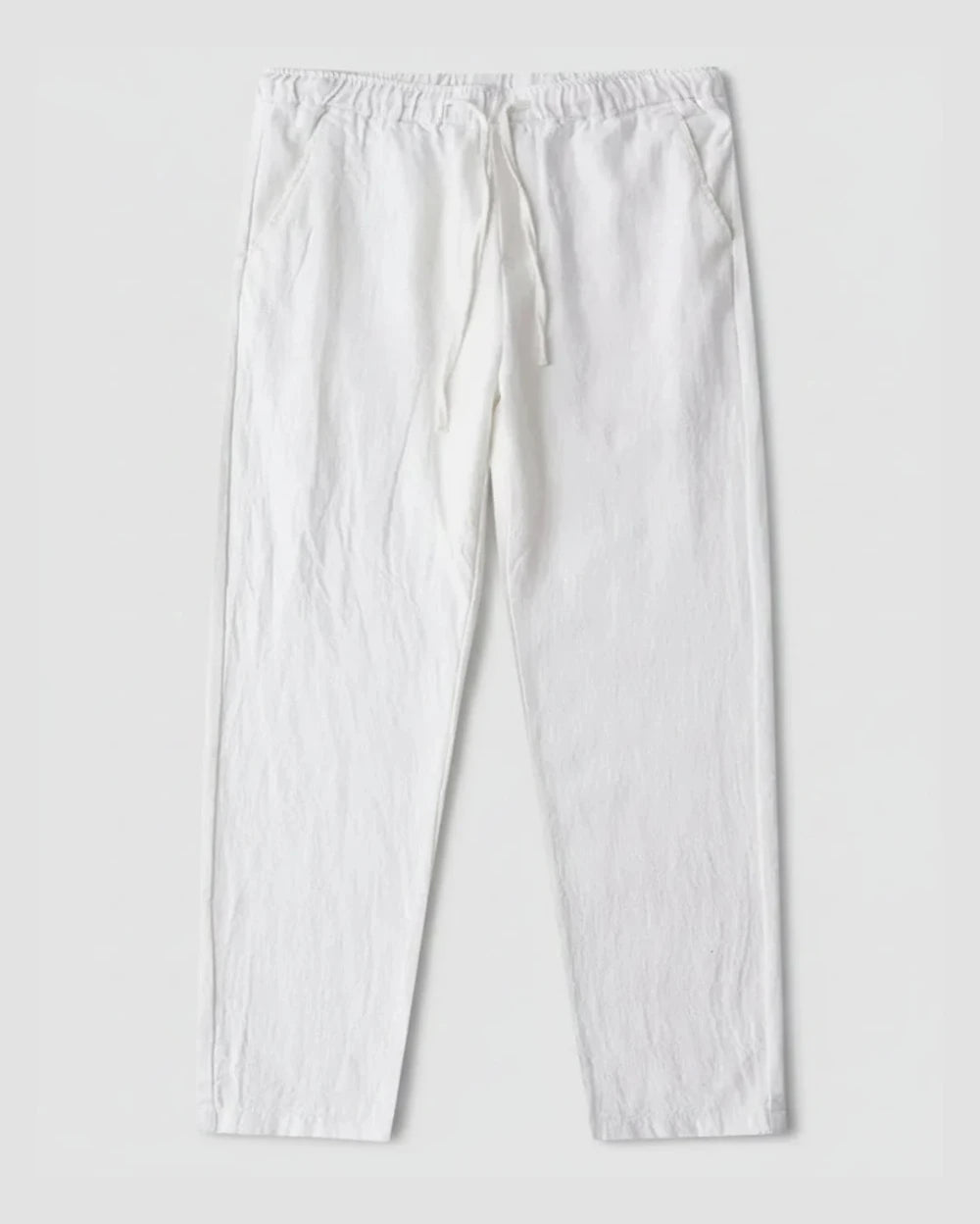 Pantalon Clément homme blanc, matière naturelle, silhouette droite.