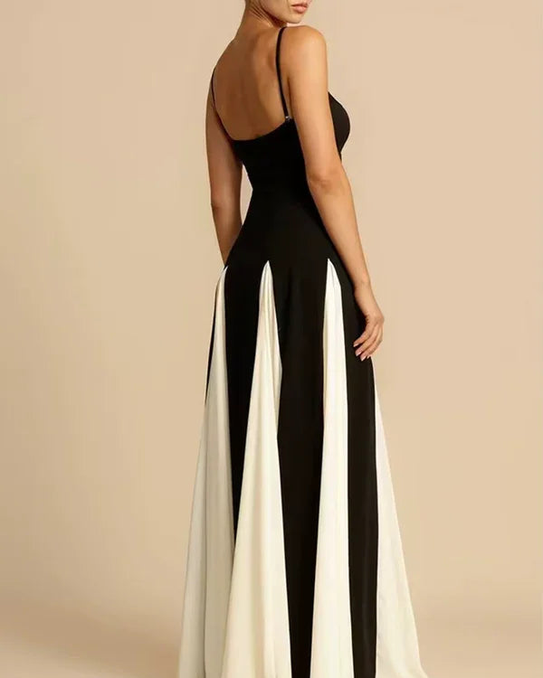 Robe Edna noire élégante, col en V et longueur au sol.